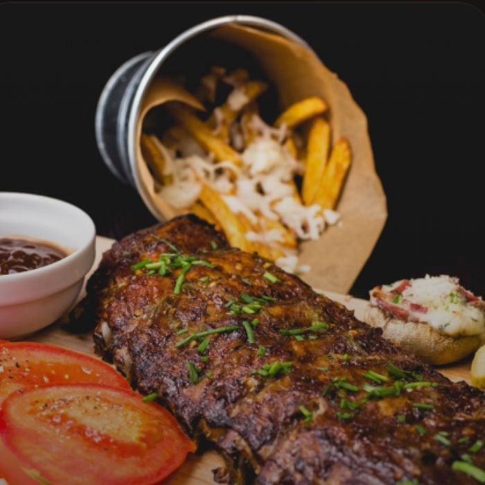 Grilled steak plate with sides